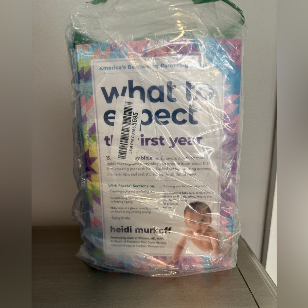 Brand New! What to Expect the First Year Book